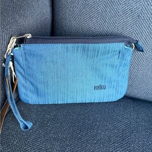 Haiku stride clutch crossbody